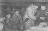Командующий 4-й армией генерал-майор П. А. Иванов вручает воинам правительственные награды. (1942 г.)